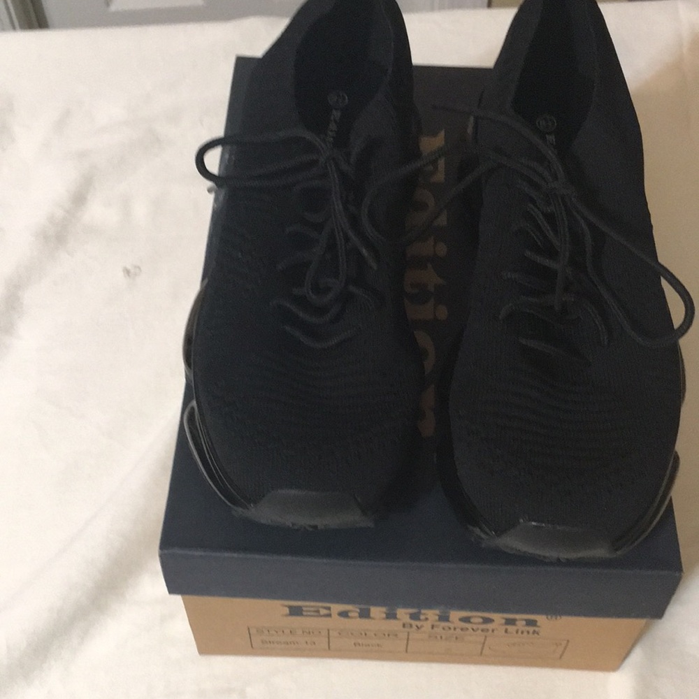 ladies black 8/1/2 slip on sneakers